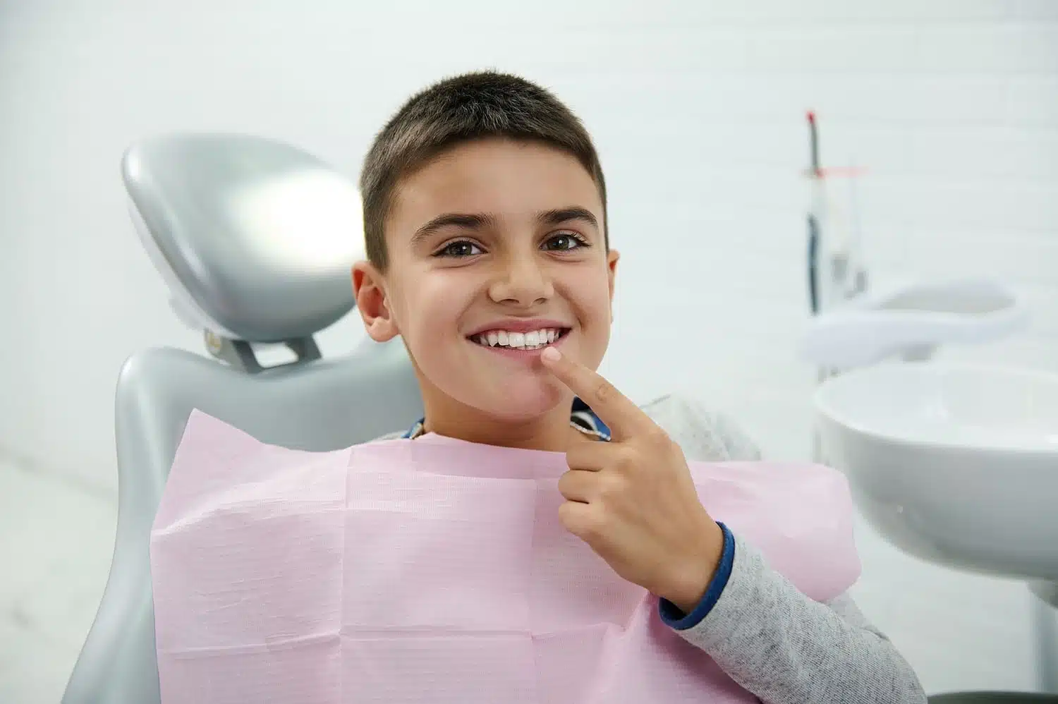 Patient smiling after orthodontic treatment near Chappaqua NY